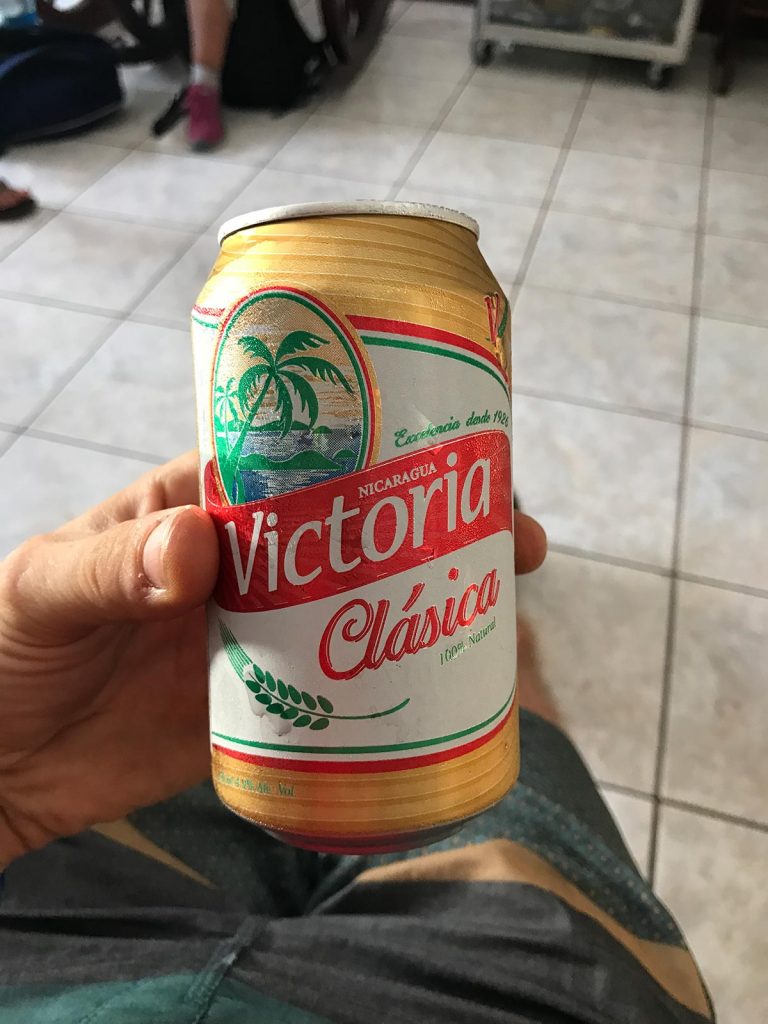 Local beer in can in Leon, Nicaragua. Volcano boarding in Leon, Nicaragua & full guide
