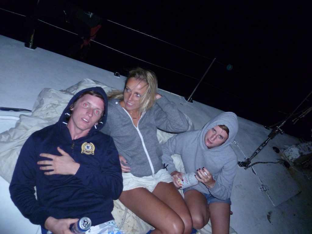 David Simpson with two girls during the Whitsundays cruise. Sleeping under the stars at the Whitsundays