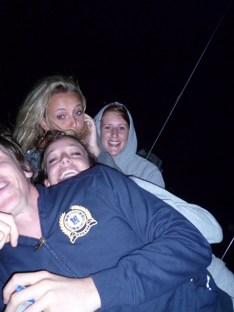 David Simpson with three girls during the Whitsundays cruise. Sleeping under the stars at the Whitsundays