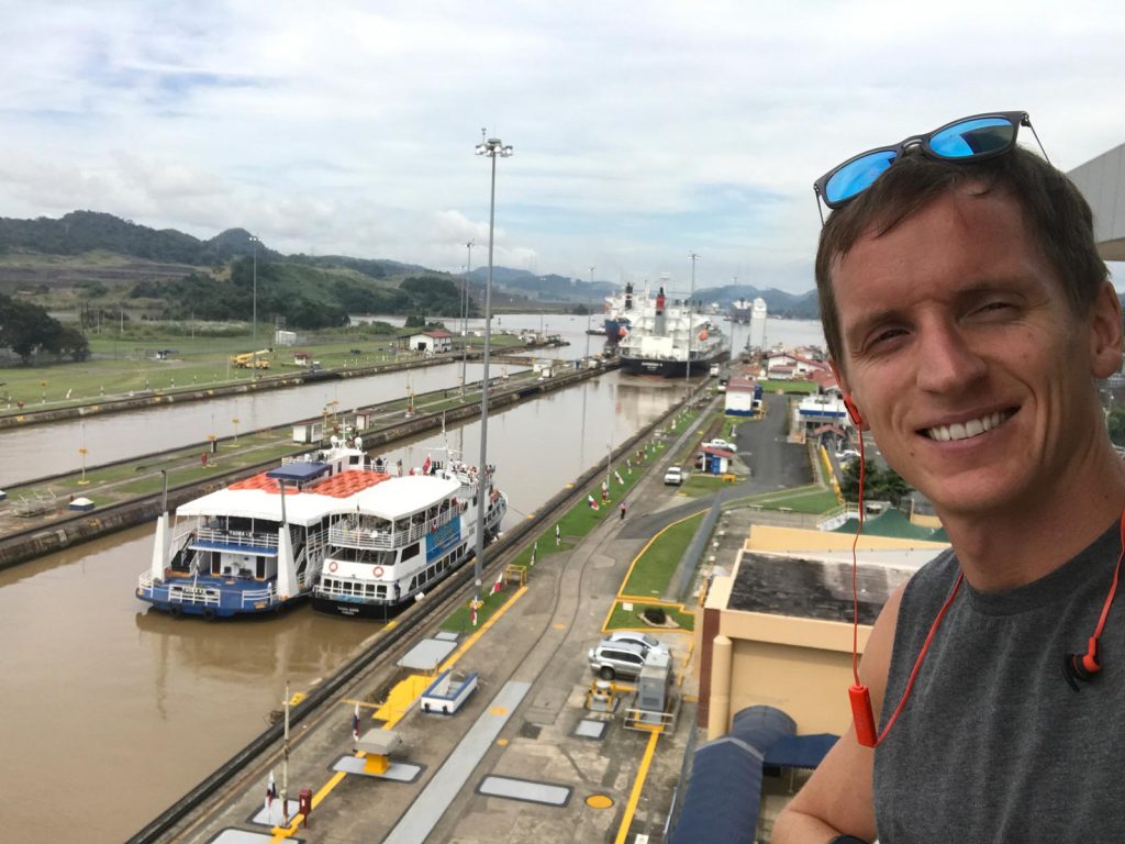 David Simpson and ships crossing at Panama Canal in Panama City, Panama. Panama Canal & the last of Central America
