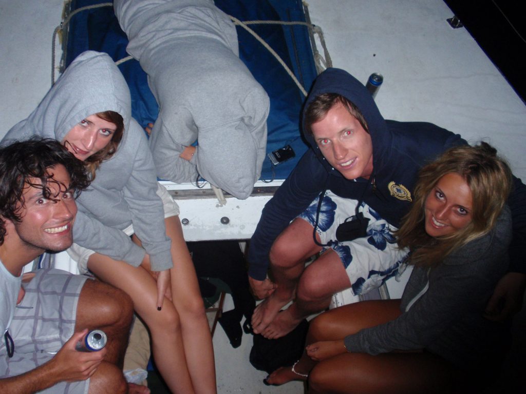 David Simpson with a guy and two girls during the Whitsundays cruise. Sleeping under the stars at the Whitsundays