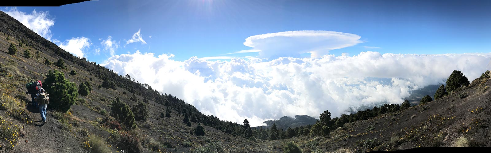 Hiking above the clouds in Antigua, Guatemala. Volcano hiking in Guatemala