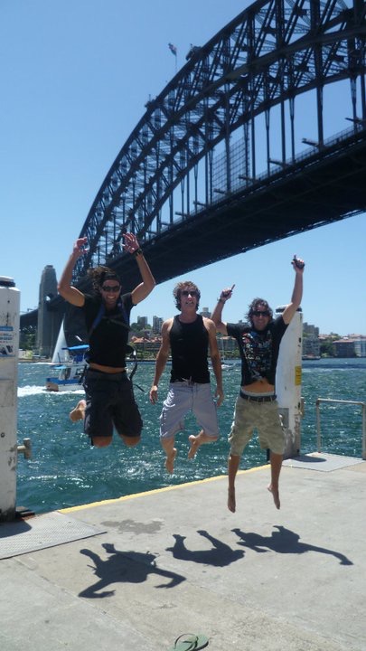 David Simpson and two guys jumping along the Sydney Harbor Bridge. Walking Sydney Bridge & The Blue Mountains