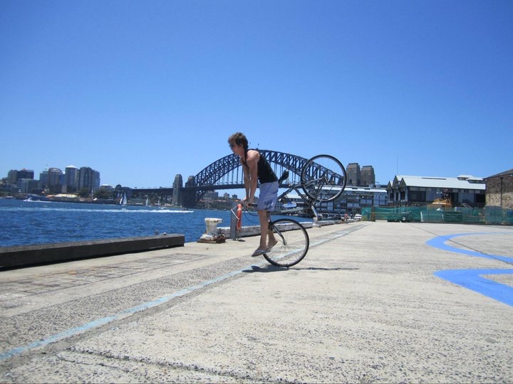 David Simpson biking along the Sydney Harbor Bridge. Walking Sydney Bridge & The Blue Mountains