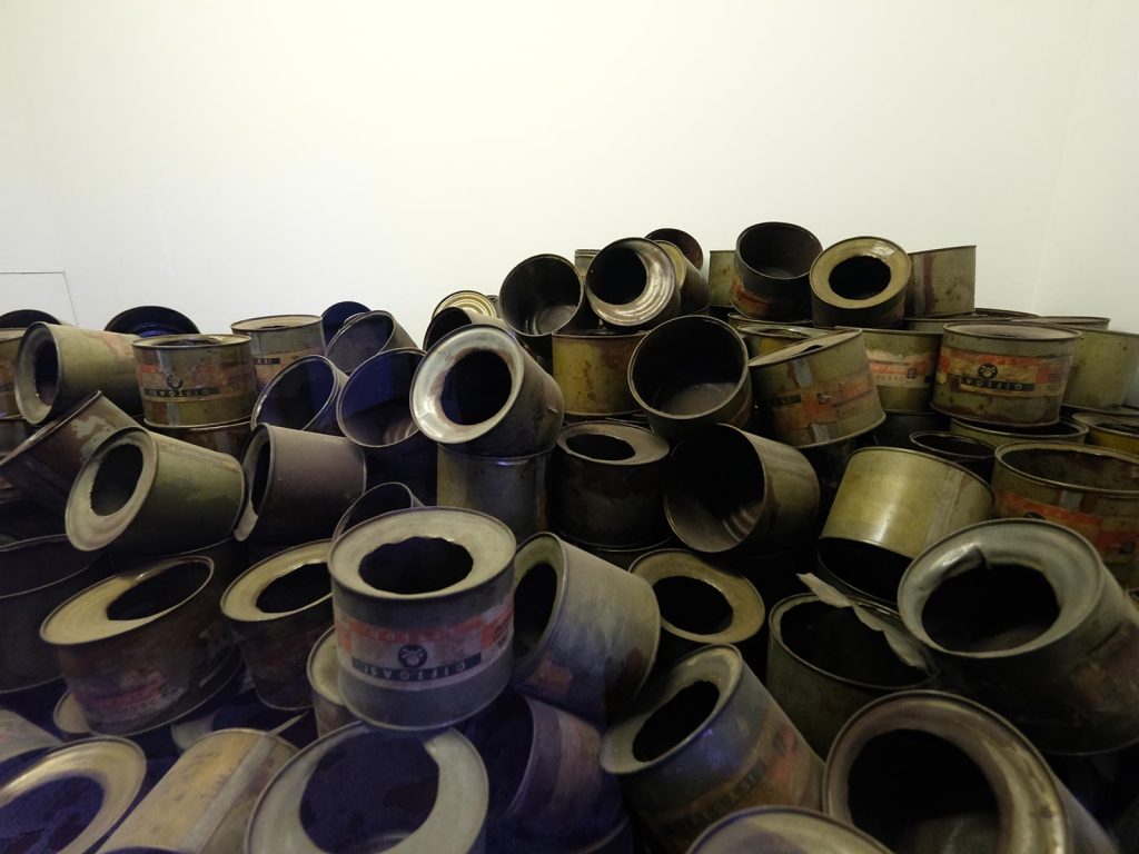 Cans that used to contain poison gas pellets in Auschwitz, Oświęcim, Poland. Mixed feelings in Auschwitz