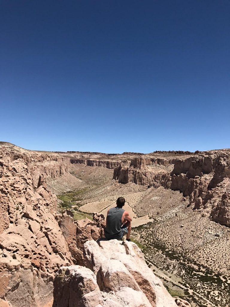 David Simpson enjoying the view at a canyon in Atacama, Chile. Atacama desert & Bolivian salt flats road trip & full guide