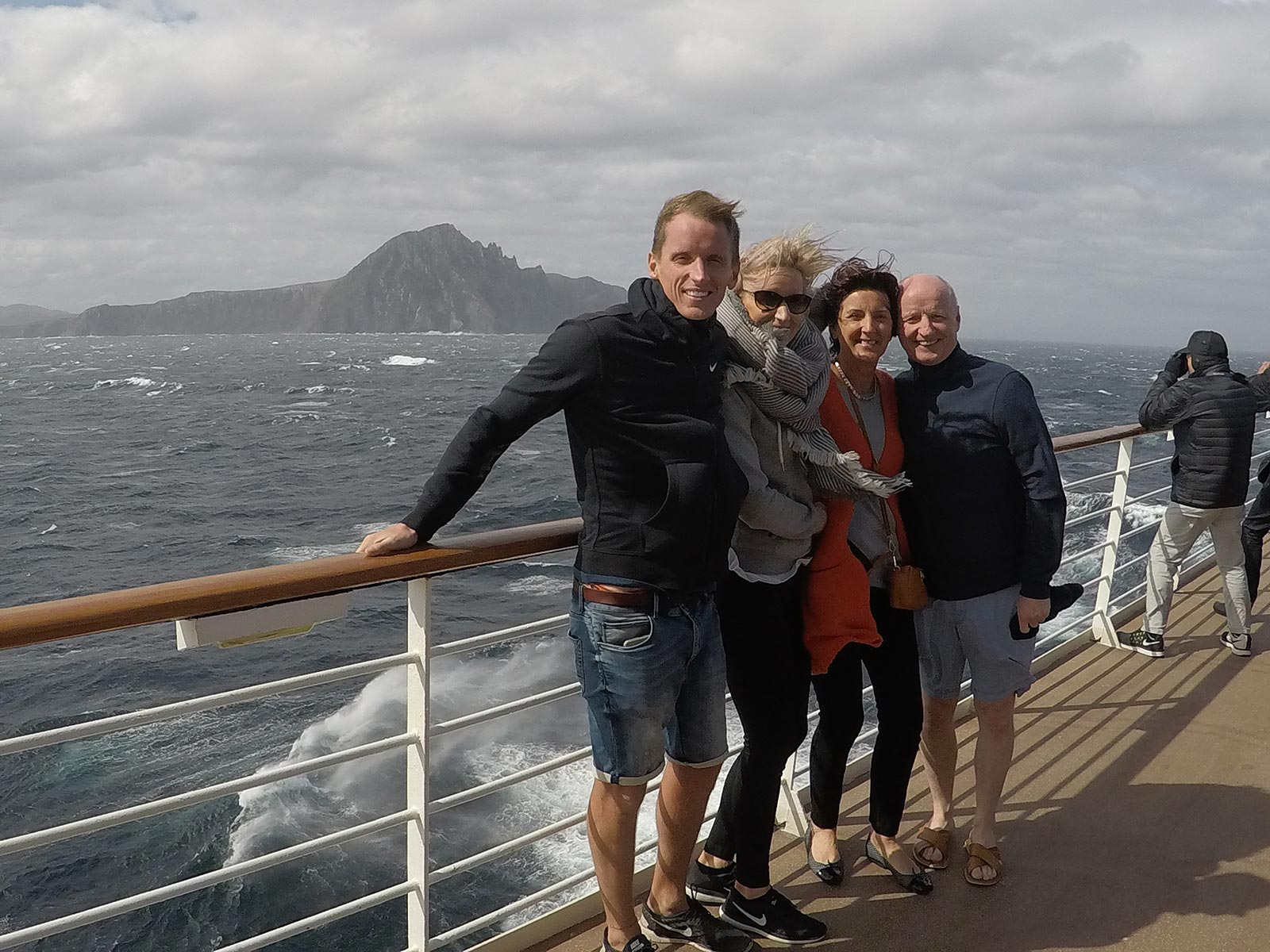 David Simpson and family viewing Cape Horn onboard cruise ship at sea. Cape Horn on the Cruise to the end of the world