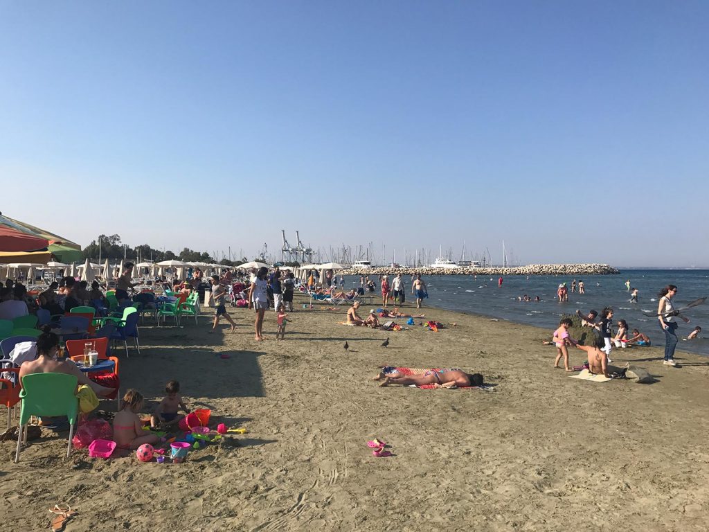 Finikoudes Beach with many people in Larnaca, Cyprus. Lebanon & Cyprus, country 100!!!