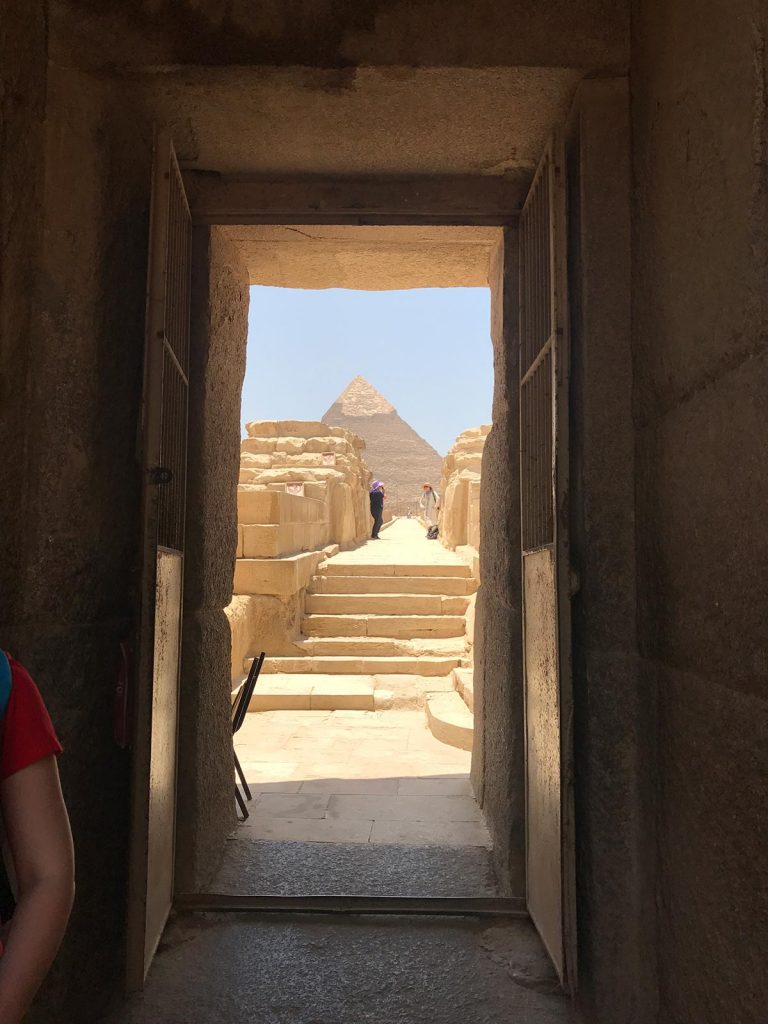Entrance to the pyramid in Cairo, Egypt. Getting inside the Ancient Pyramids of Giza
