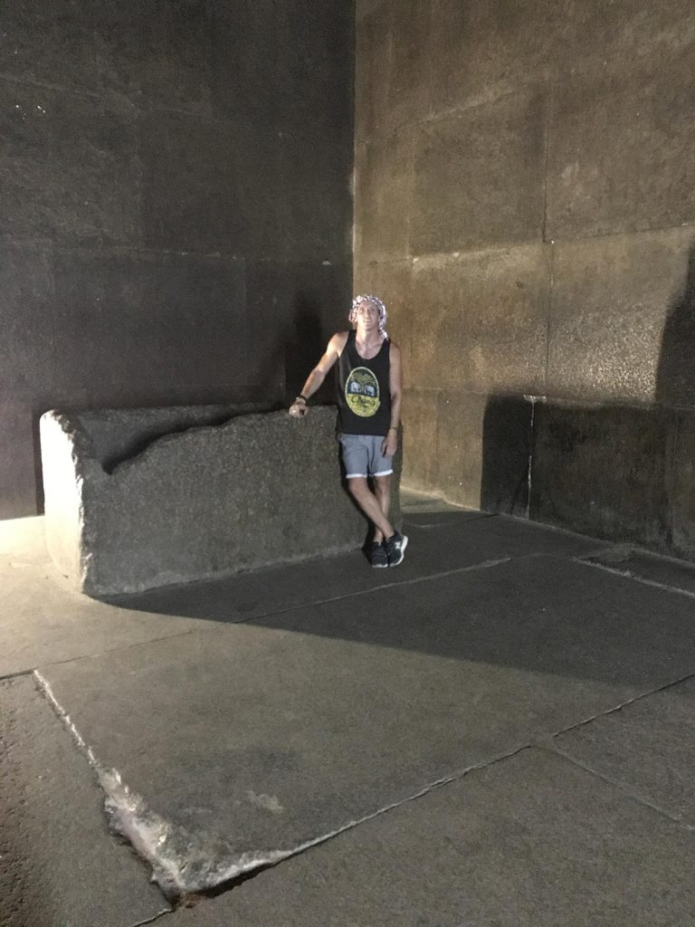 David Simpson inside a burial chamber of a pyramid in Cairo, Egypt. Getting inside the Ancient Pyramids of Giza