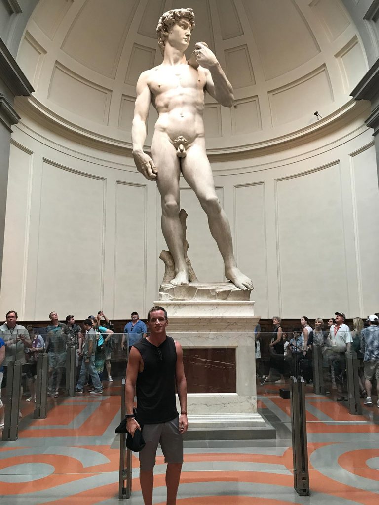 David Simpson and the statue of Michelangelo’s David in Florence, Italy. Leaning Pisa & impressive Florence