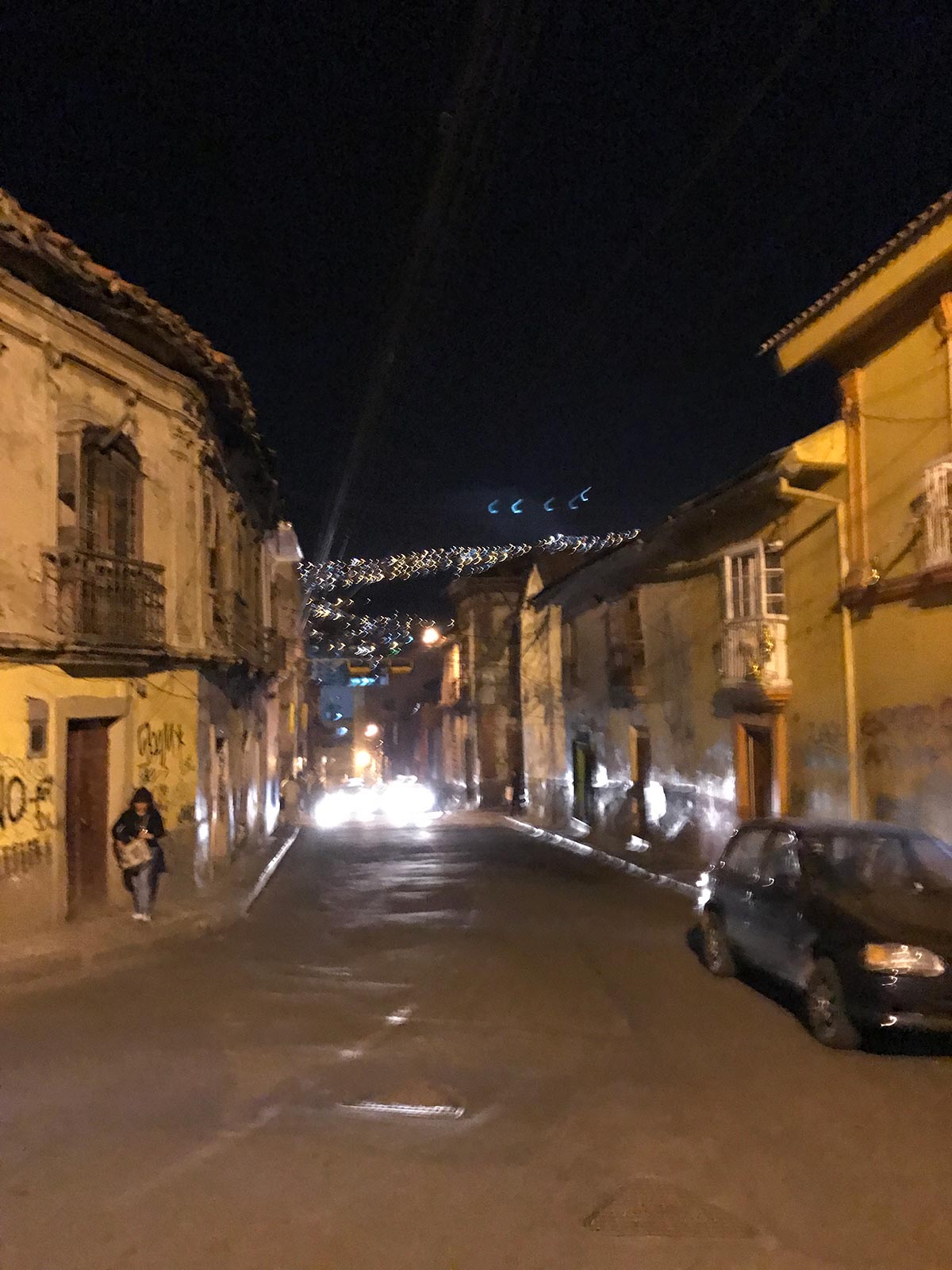 A street at night in Cusco, Peru. Getting robbed by Police in Peru