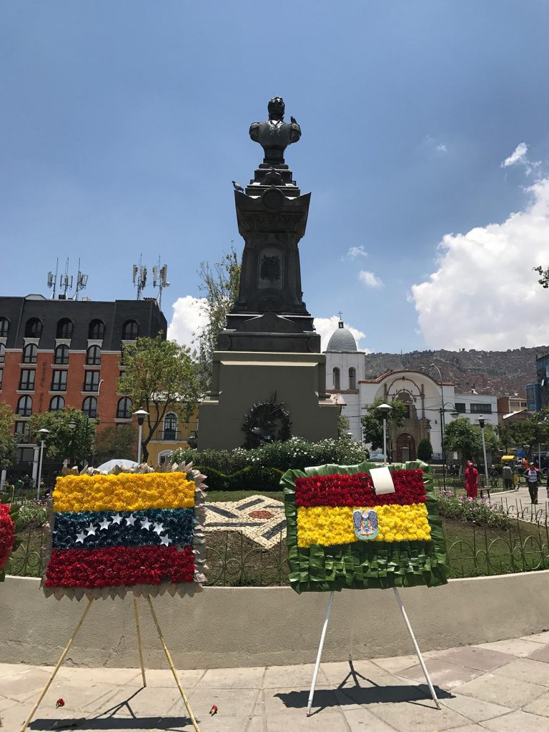 National monument with wreath of flowers in Cusco, Peru. Getting robbed by Police in Peru