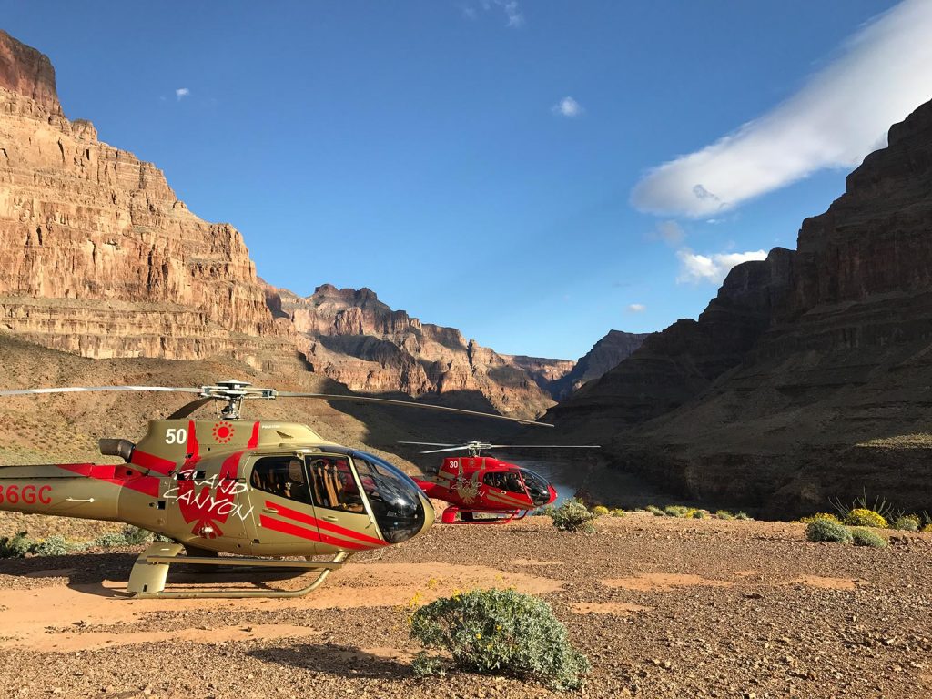 Two helicopters in Grand Canyon, USA. Helicopter tour over the Grand Canyon