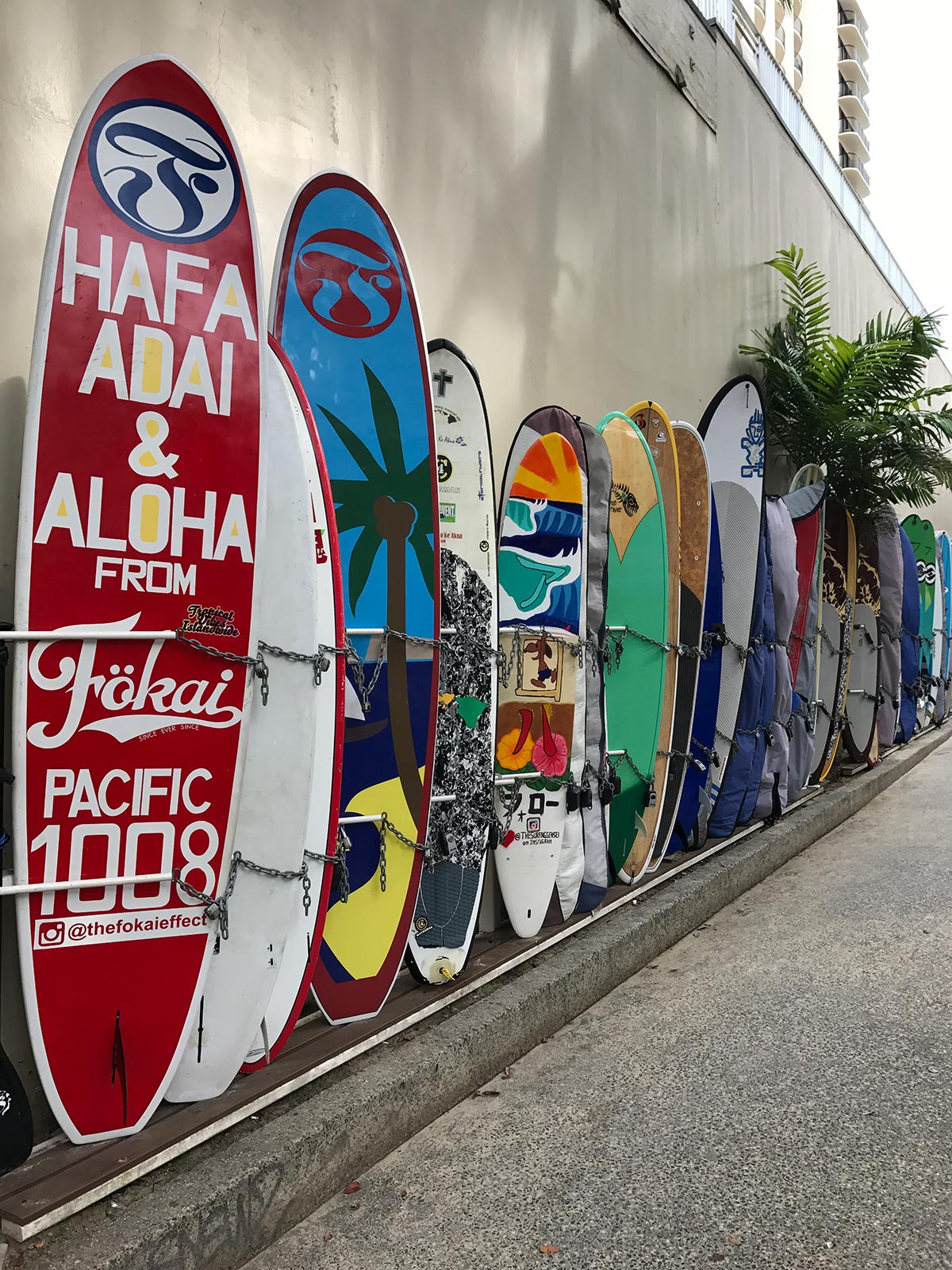 Surfboards on display in Oahu, Hawaii. Skydiving over Hawaii