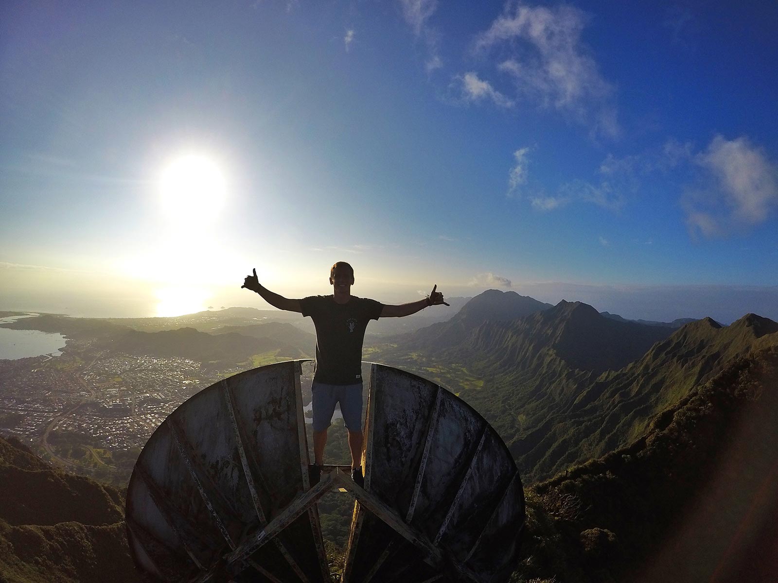 David Simpson on top of old satellite dish at the top of Stairway to Heaven in Oahu, Hawaii. Climbing the stairway to heaven, Hawaii & full guide