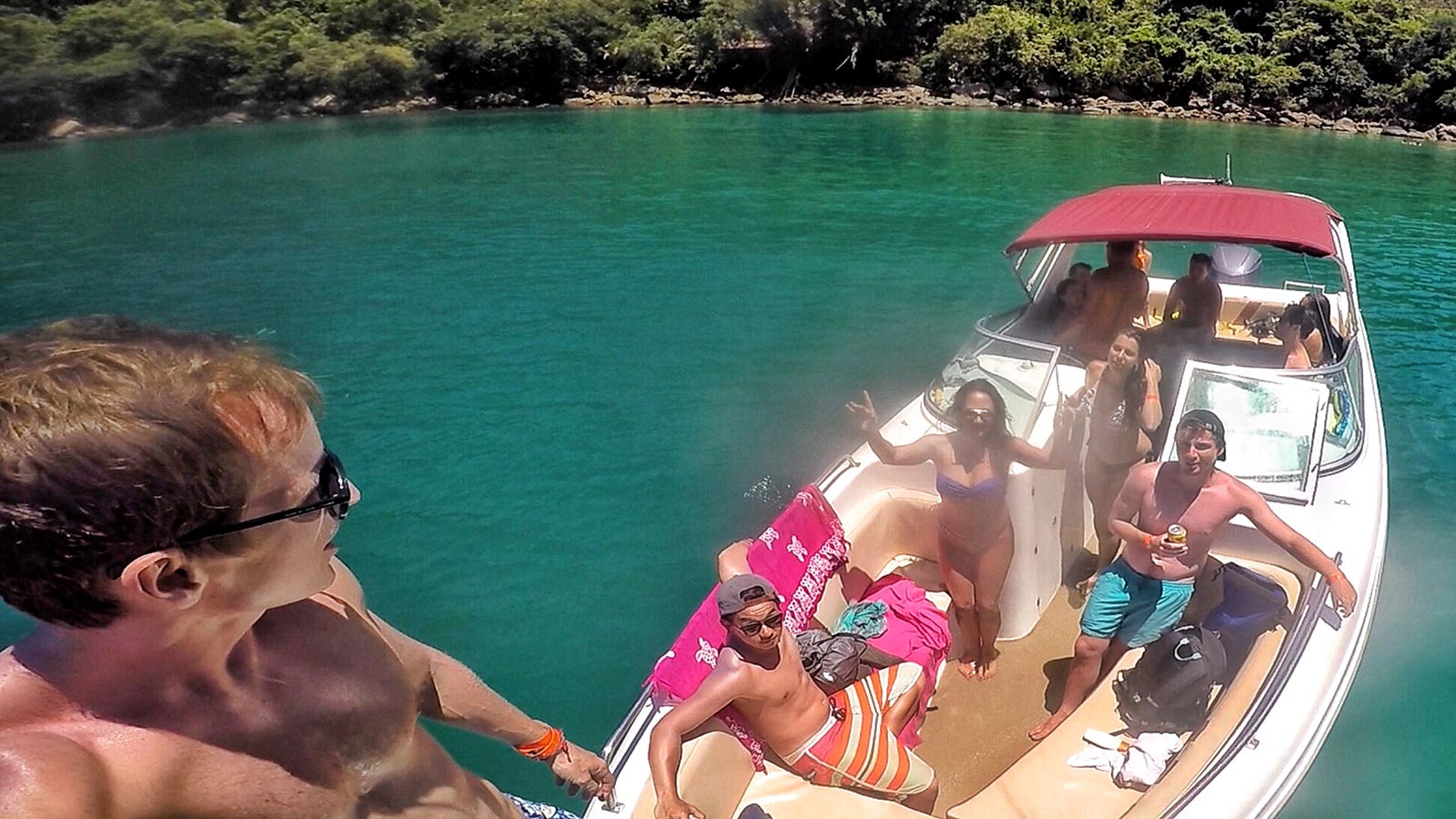 David Simpson and friends at speedboat tour in Ilha Grande, Brazil. Ilha Grande cures the hangover from hell