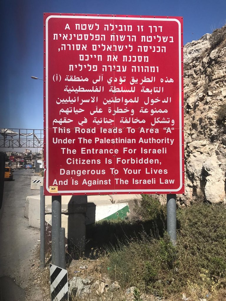 Warning sign at Palestine in Jerusalem, Israel. My time in Jerusalem, a special city divided