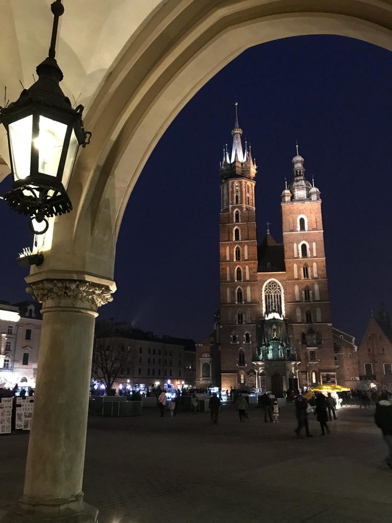 Basilica of the Virgin Mary at night at Jewish Quarter in Kazimierz, Krakow, Poland. Mixed feelings in Auschwitz