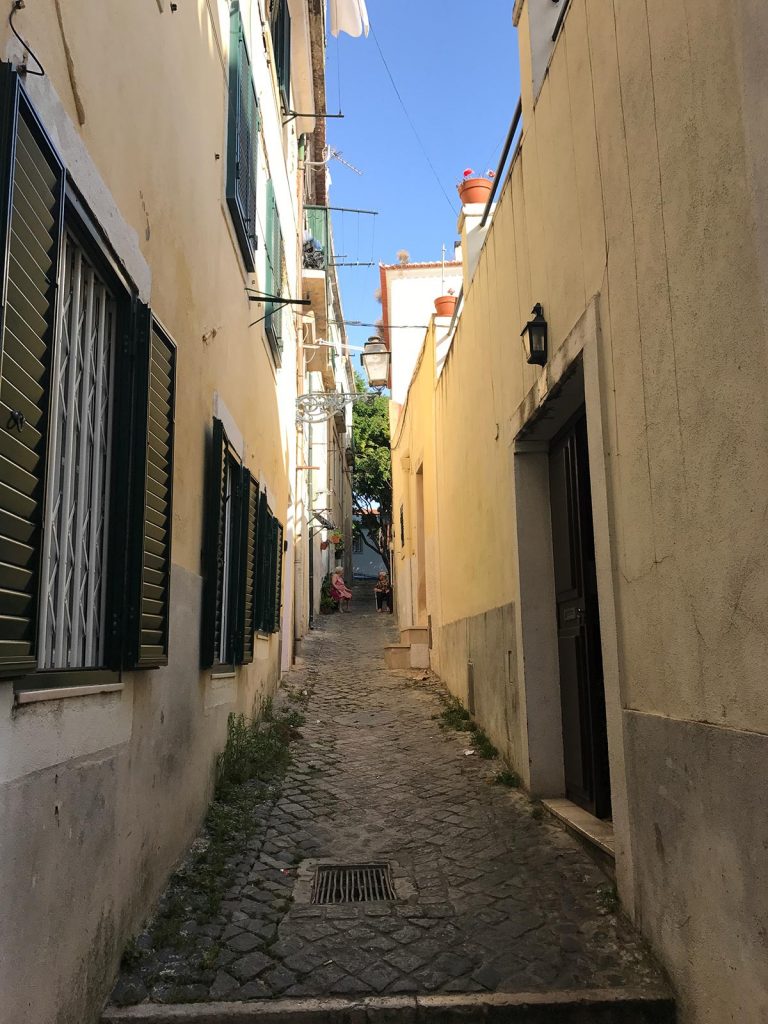 A narrow street in Lisbon, Portugal. Lisbon & Porto, where the blog was conceived