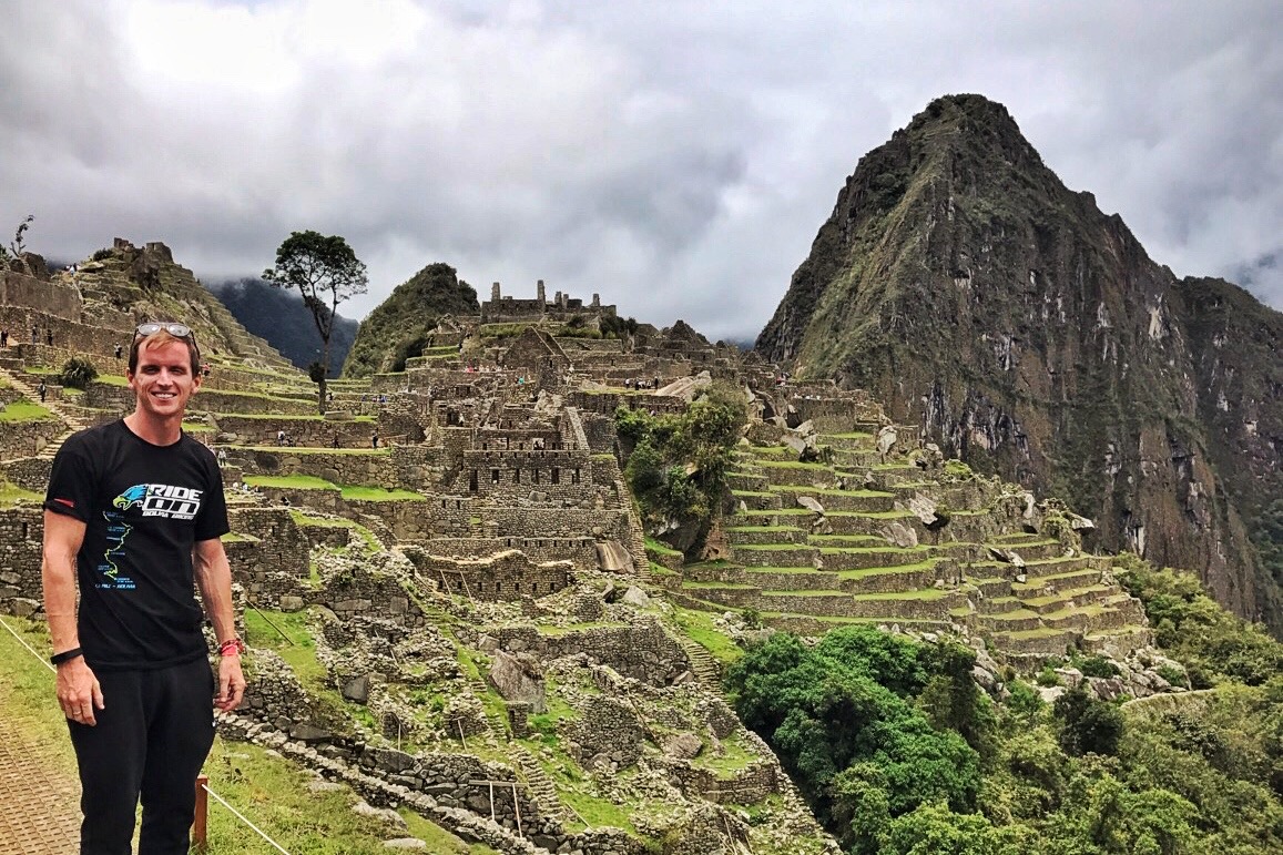 David Simpson and the ruins in Machu Picchu, Peru. Checking out Machu Picchu and Full Guide
