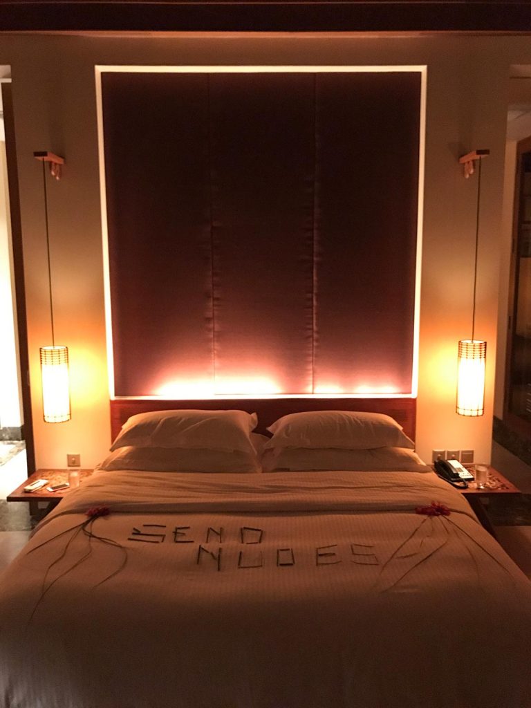 Cozy bed with lighted headboard in Maldives. The Maldives & upgraded to the best villa on the island