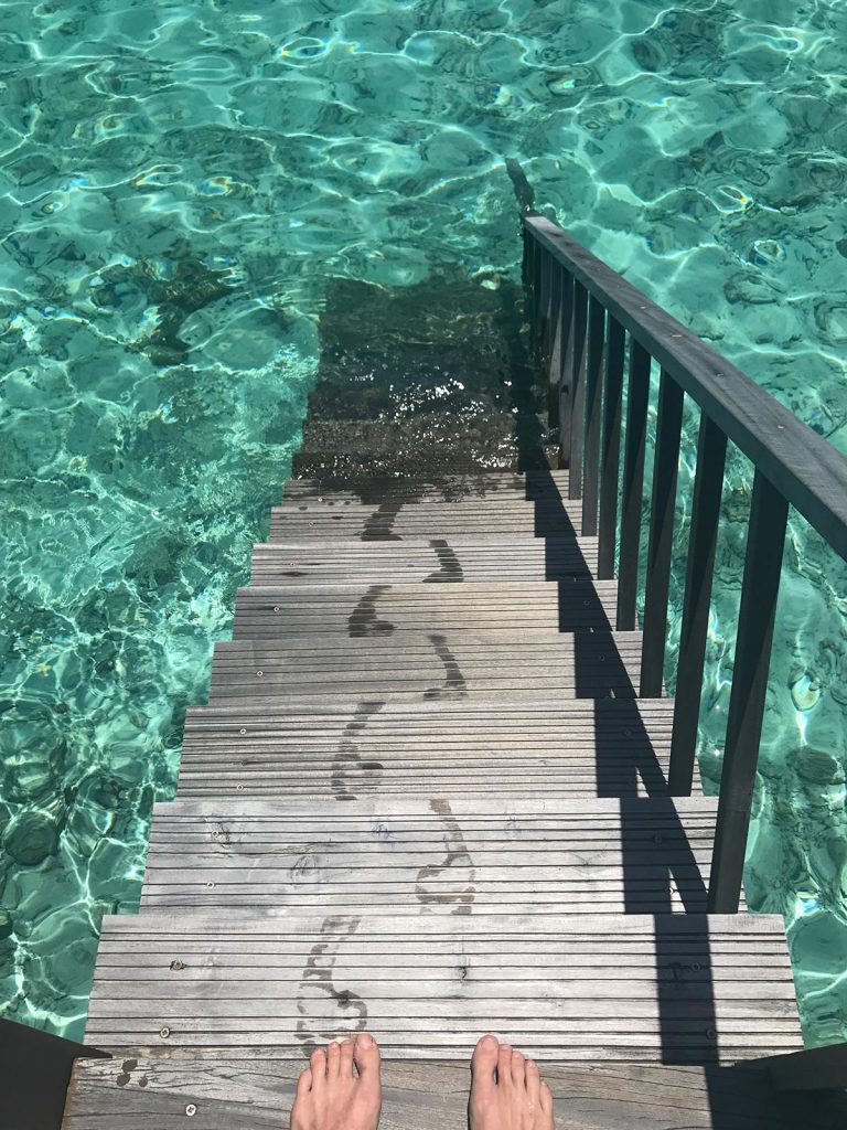 Stairs to the water at water villa in Maldives. The Maldives & upgraded to the best villa on the island
