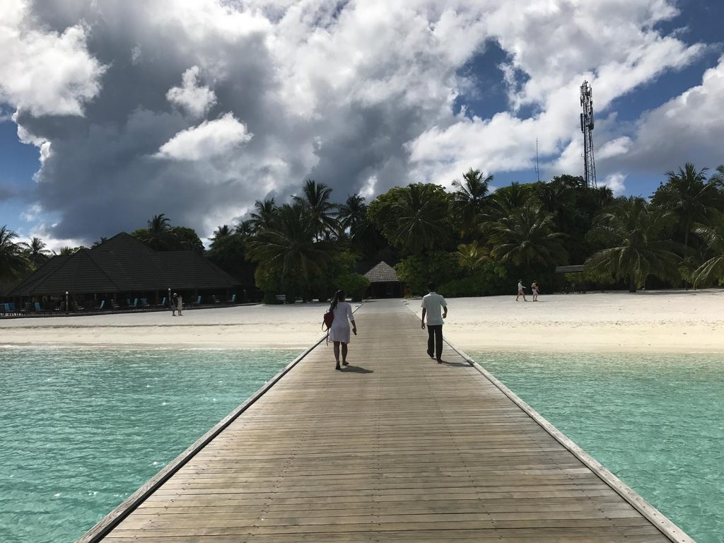Walkway to the beach in Maldives. The Maldives & upgraded to the best villa on the island