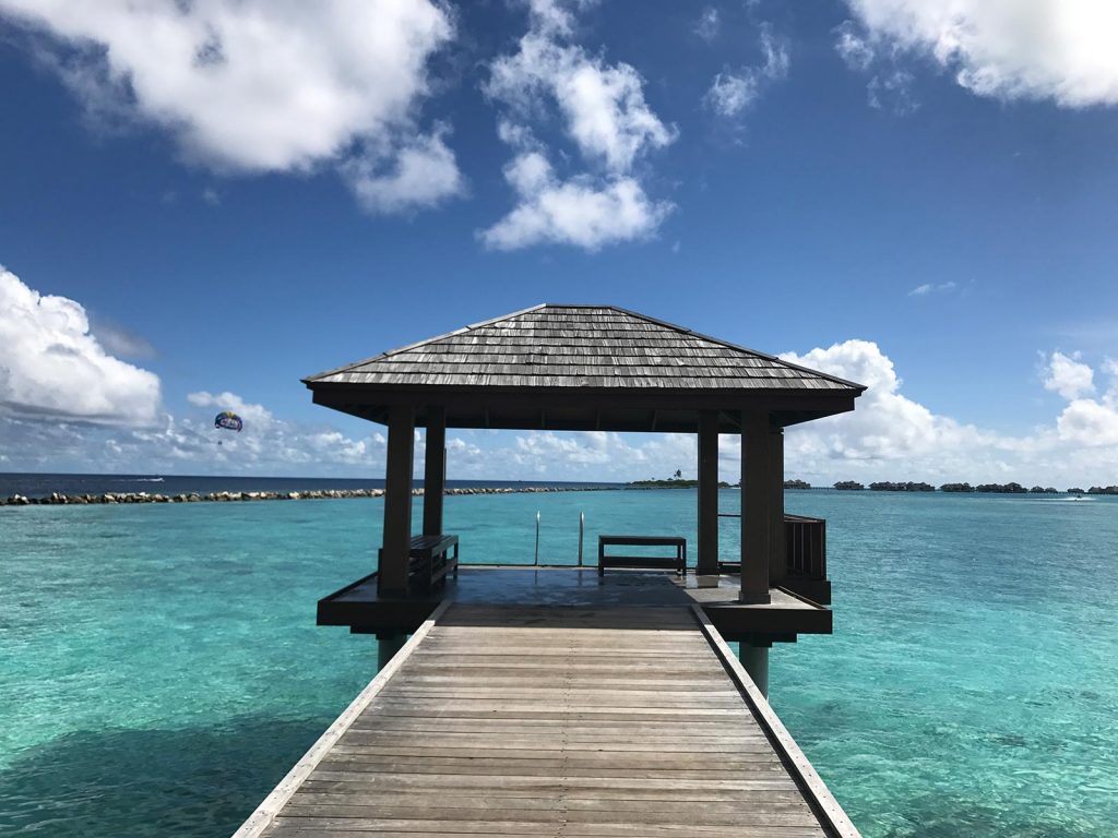 Covered platform to the sea in Maldives. The Maldives & upgraded to the best villa on the island