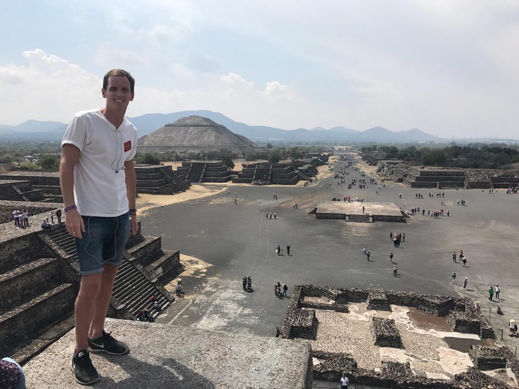 David Simpson on top of a pyramid in Teotihuacan, Mexico. Mexico City & Teotihuacan