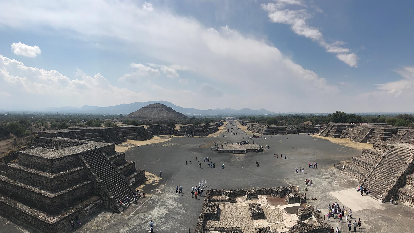 Temples, pyramids and plazas with its visitors in Teotihuacan, Mexico. Mexico City & Teotihuacan