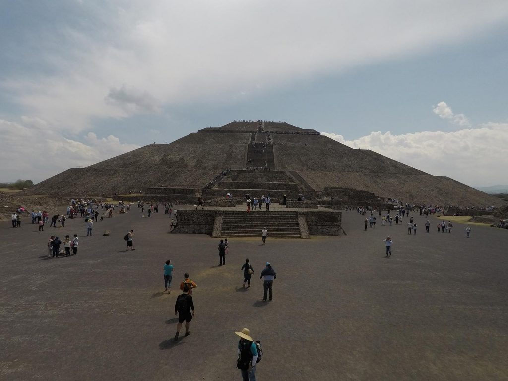 A pyramid and its visitors in Teotihuacan, Mexico. Mexico City & Teotihuacan