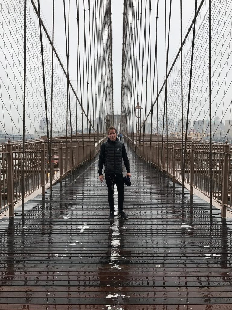 David Simpson at Brooklyn Bridge in New York City, USA. A missed flight to New York