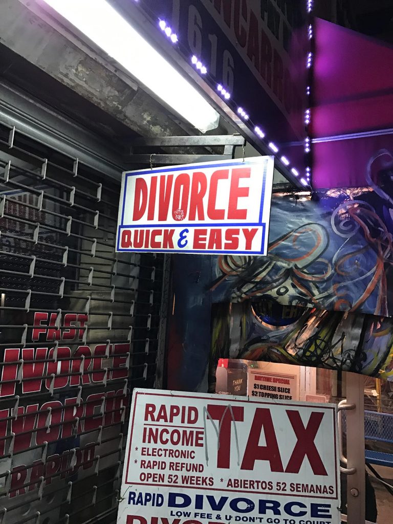 Divorce attorney's office sign in New York City, USA. A missed flight to New York