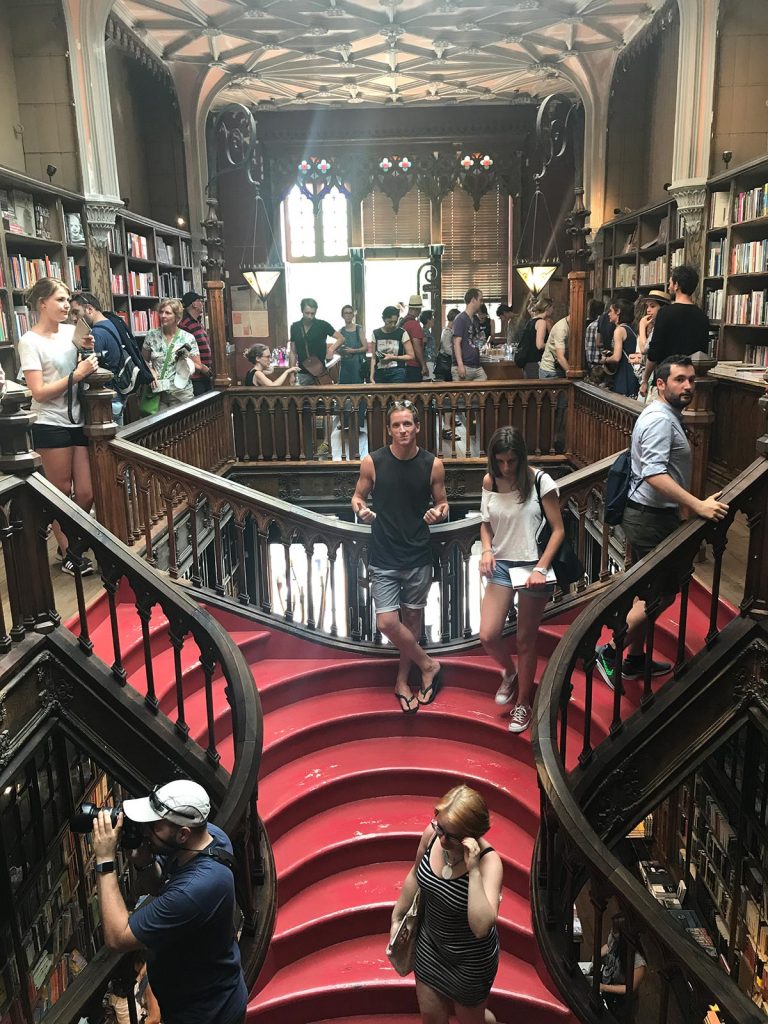 David Simpson at stairs of Lello Bookshop in Porto, Portugal. Lisbon & Porto, where the blog was conceived
