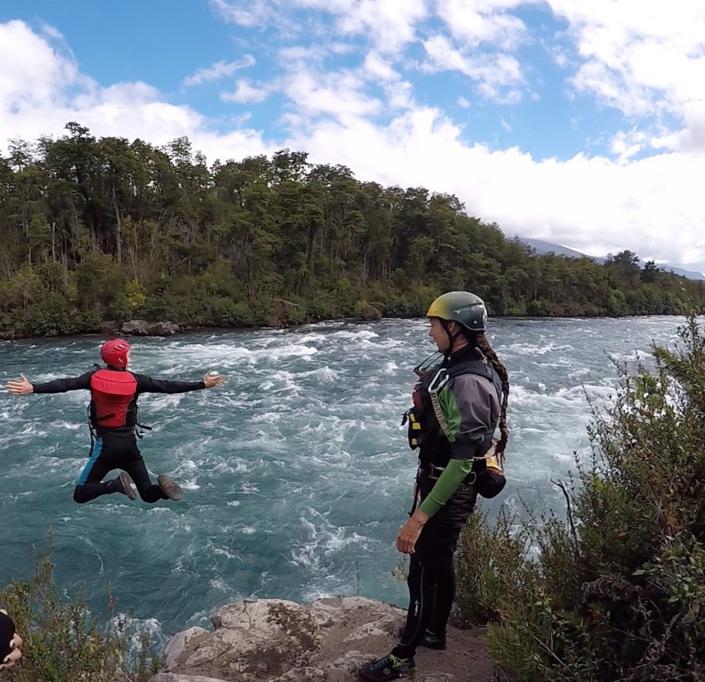 David Simpson jumping into the river as friend girl watches on White Water rafting at Puerto Montt, Chile. Valparaiso & The Cruise to the end of the World pt3