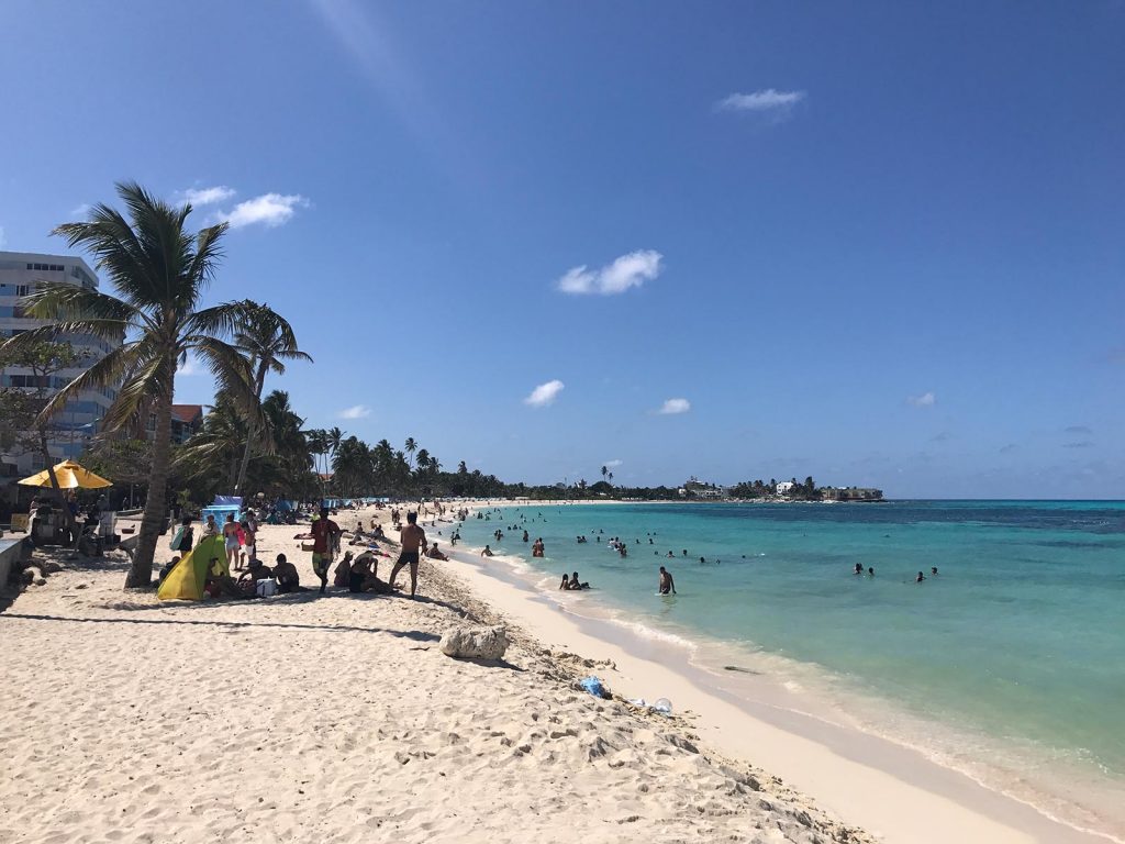 Beach and beach-goers in San Andres, Colombia. 4 weeks and Carnival in Colombia