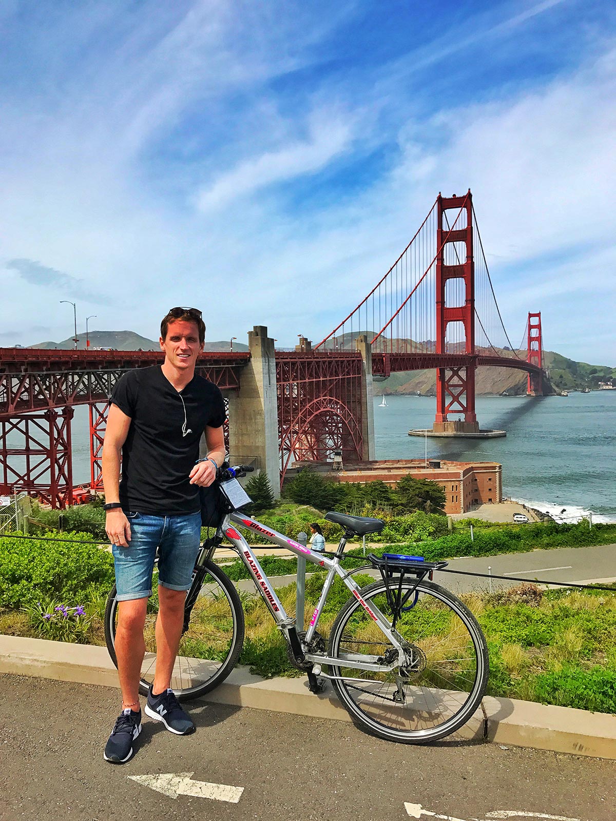 David Simpson with his bike and the Golden Gate Bridge in San Francisco, USA. L.A. & San Fran, revisiting the West Coast