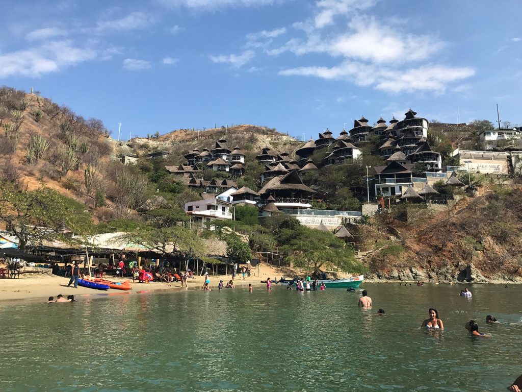 Beach and beach-goers and resort in the mountain in Santa Marta, Colombia. 4 weeks and Carnival in Colombia