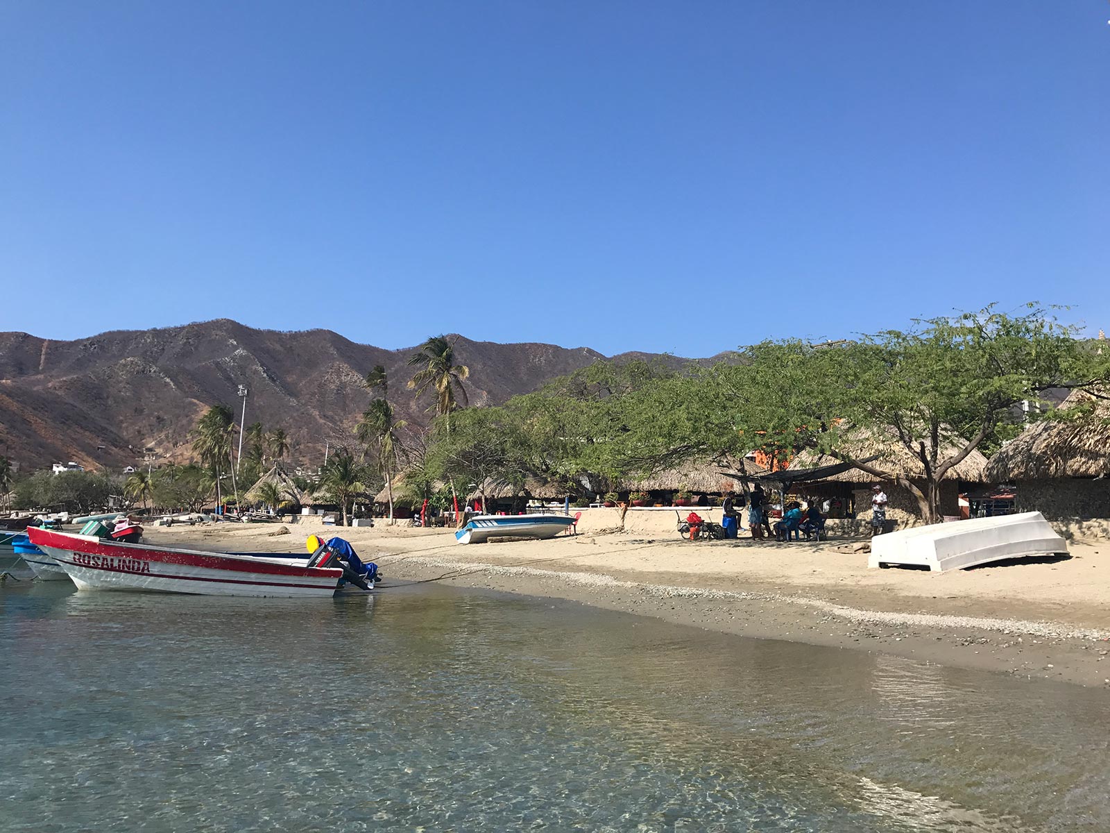 Boats by the beach by the mountain in Santa Marta, Colombia. 4 weeks and Carnival in Colombia