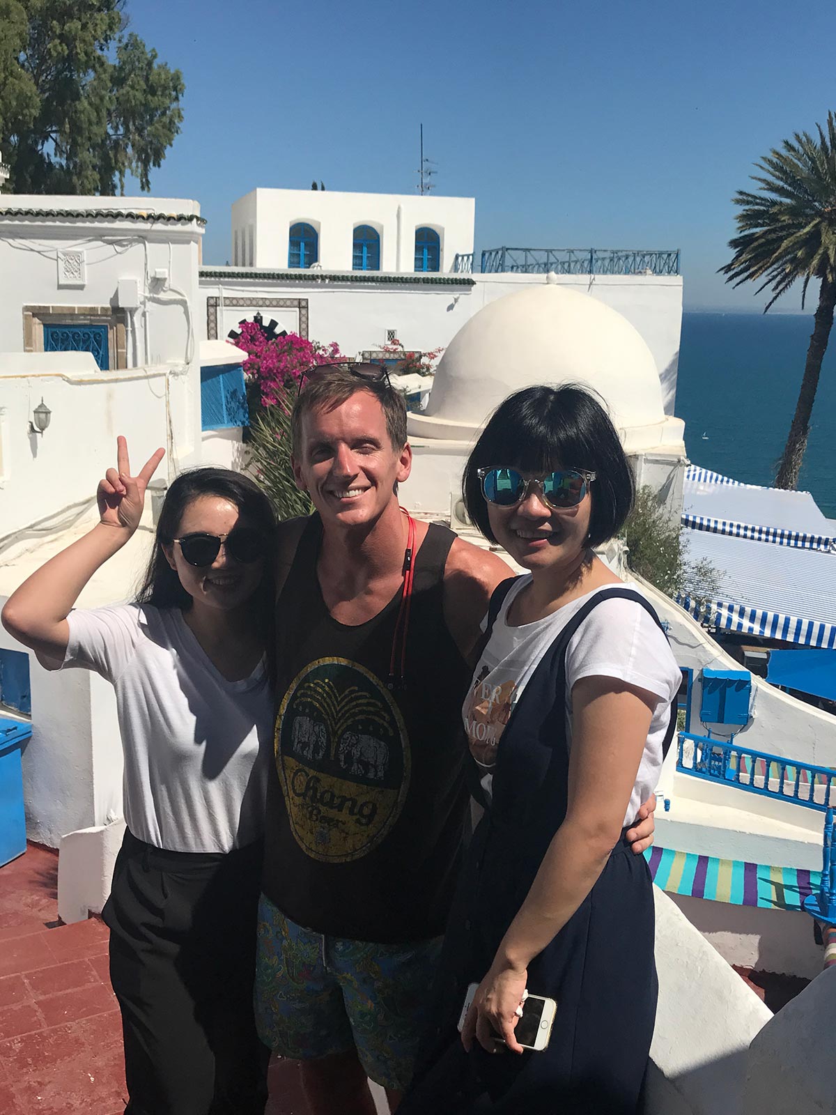 David Simpson with friend girls in Sidi Bou Said, Tunisia. Tunisia and not taking travel advice seriously