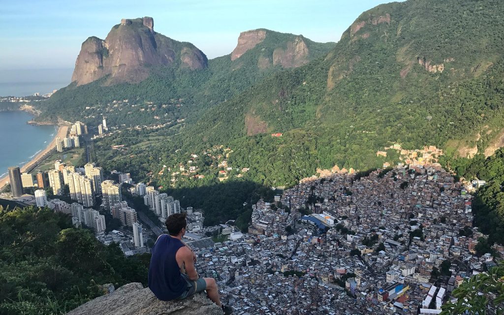 David Simpson enjoying the view of the city from the top of Two Brothers Peak in Rio de Janeiro, Brazil. The best sunrise hike in the world