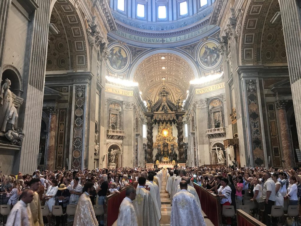 Priests and church-goers at Saint Peter's Basilica, The Vatican. The Pope and getting thrown out of The Sistine Chapel