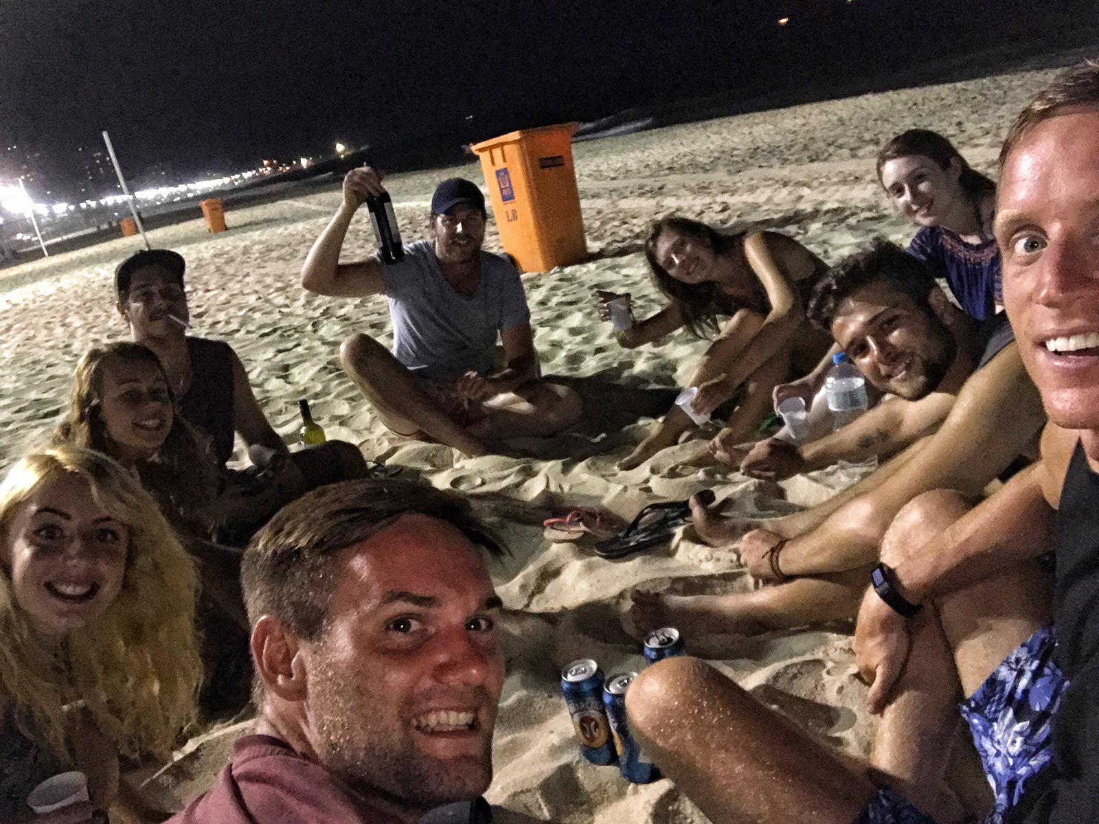 David Simpson and friends spending Christmas Eve on the beach in Rio de Janeiro, Brazil. Favelas, Christ & Sugarloaf, my intro to Rio
