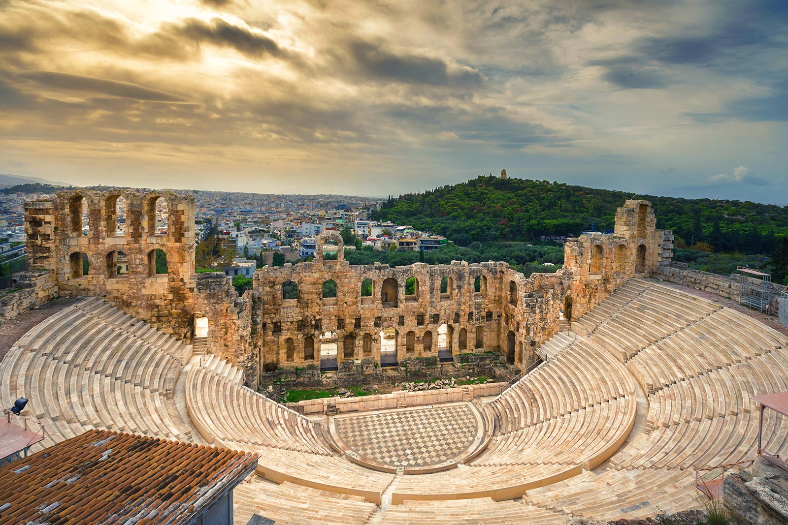 The theater of Herodion Atticus under the ruins of Acropolis, Athens during sunset. 10 things you must do in Athens
