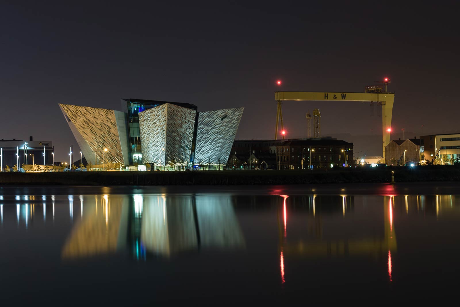 Titanic Belfast at night in Belfast, Northern Ireland. 24hrs itinerary for Belfast, drinks and petrol bombs