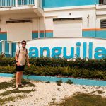David Simpson standing infront of a building in Anguilla. Caribbean reflection; beaches, late PCRs & incredible accom