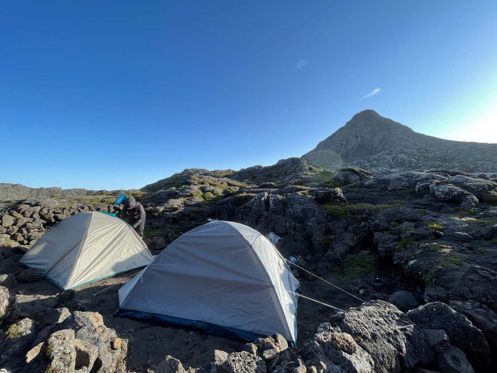 Tents on rocky camp in Pico, The Azores. Camping in volcano Pico, Portugal’s highest mountain