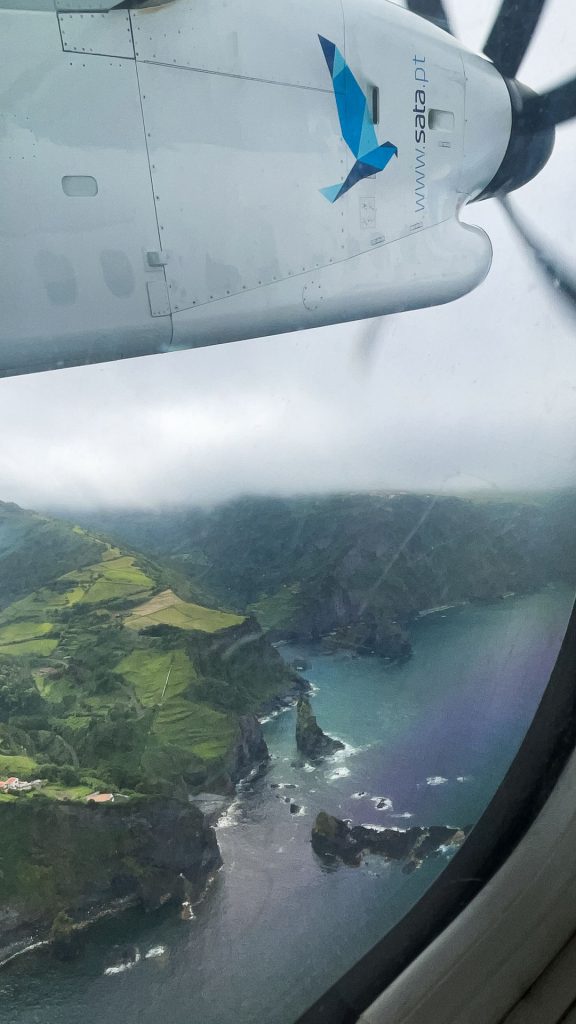 Plane window view from Flores, The Azores. Walking on the Moon & prepping for climbing Pico