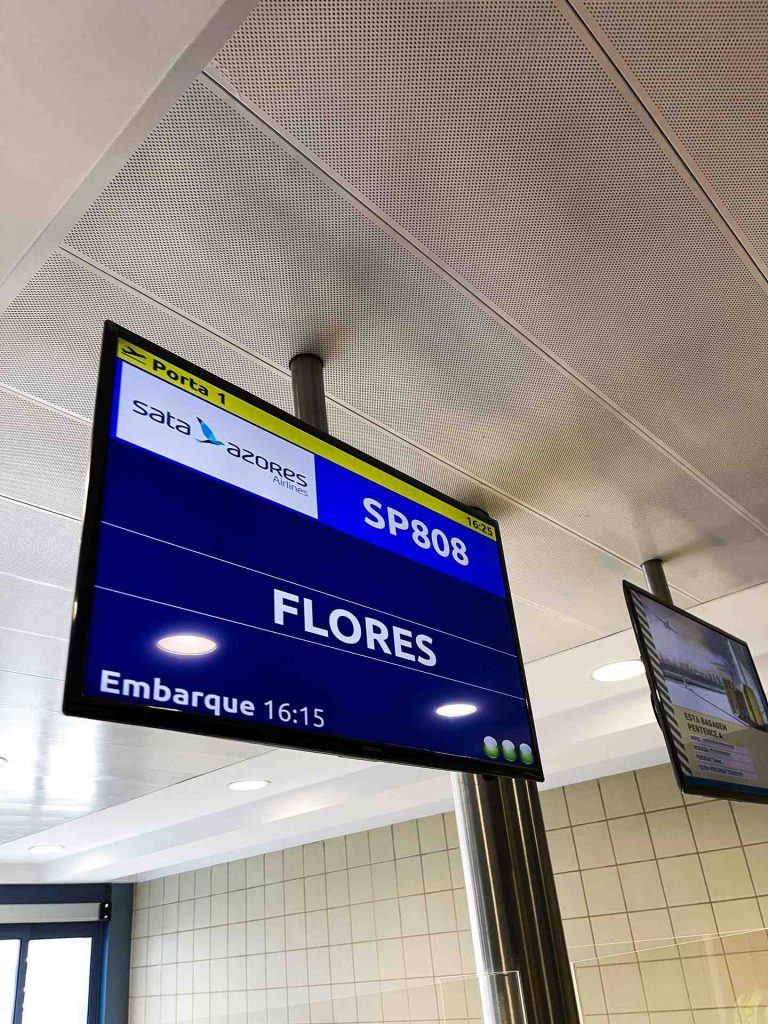 Airport destination sign to Flores, The Azores. 2 days looking at mist in Flores